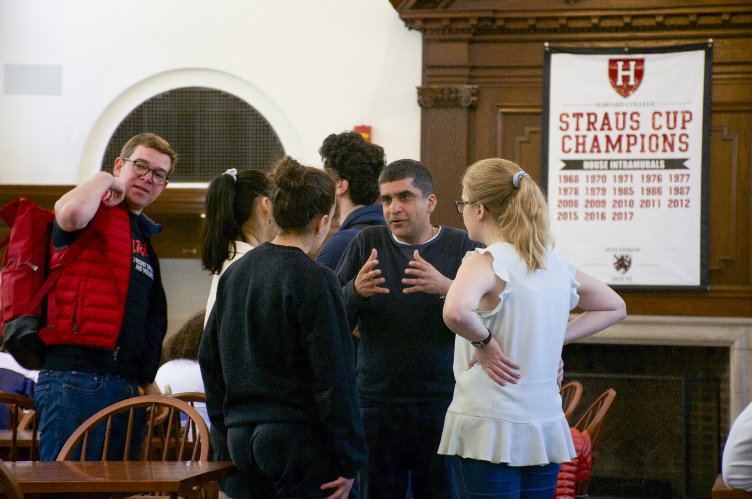 Dean of the College Rakesh Khurana speaks to students in Winthrop dining hall following his decision not to renew the house's Faculty Deans Ronald S. Sullivan and Stephanie R. Robinson in spring 2019.