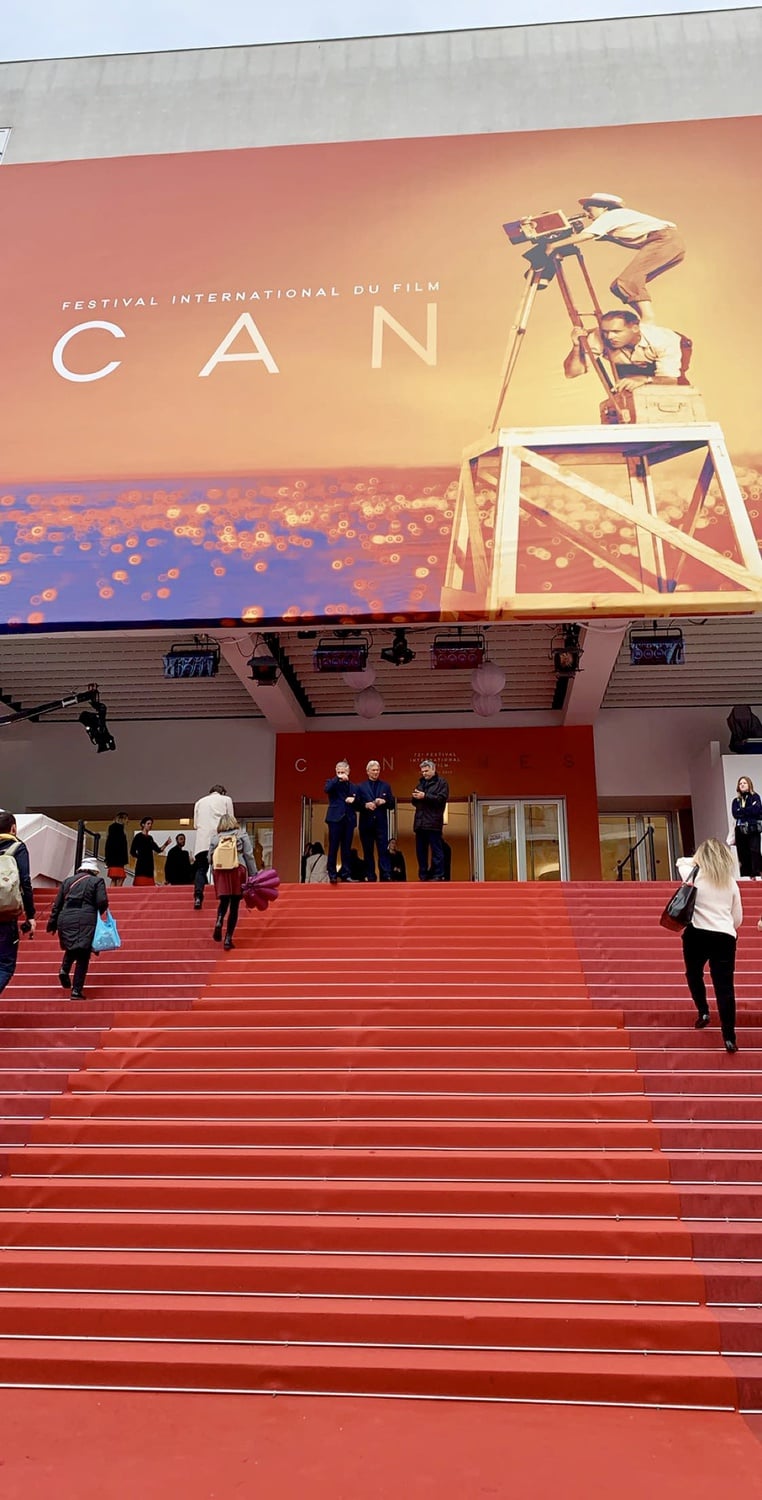 The red carpet staircase leading up to Grand Theatre Lumière, the largest and most glamorous theater at Cannes where Competition films officially premiere, usually with the crew and cast in attendance.