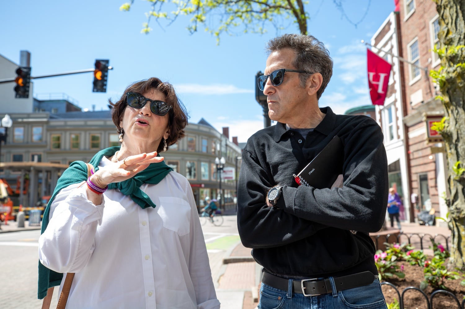 Harvard Square is home to many local and national businesses but has faced a number of closings over the last year. HBSA Director Denise Jillson is pictured here on the left.