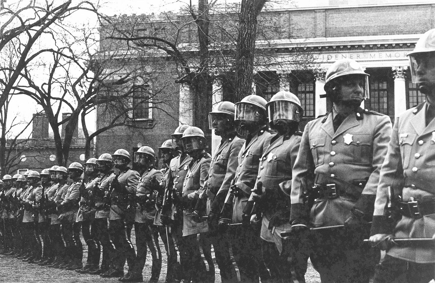 Police officers equipped with riot gear lined Tercentenary Theatre during the University Hall occupation in 1969.