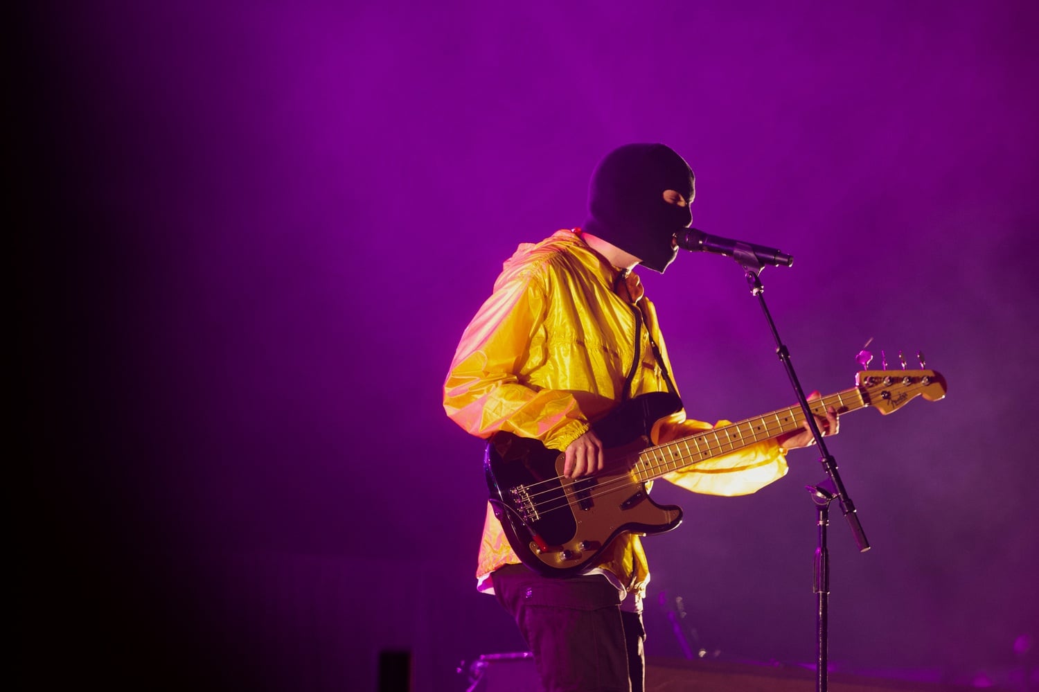 Tyler Joseph opens Twenty One Pilots' headlining set at Boston Calling 2019 in a mask.