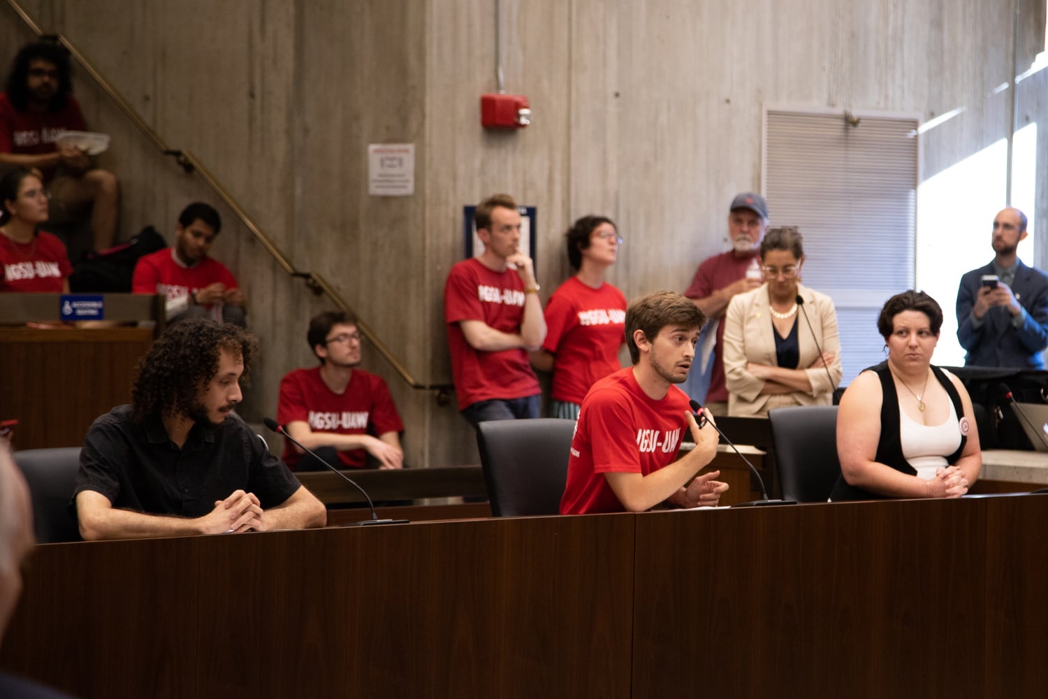 Members of the Harvard Graduate Students Union–United Automobile Workers testified at a Boston City Council hearing Thursday.