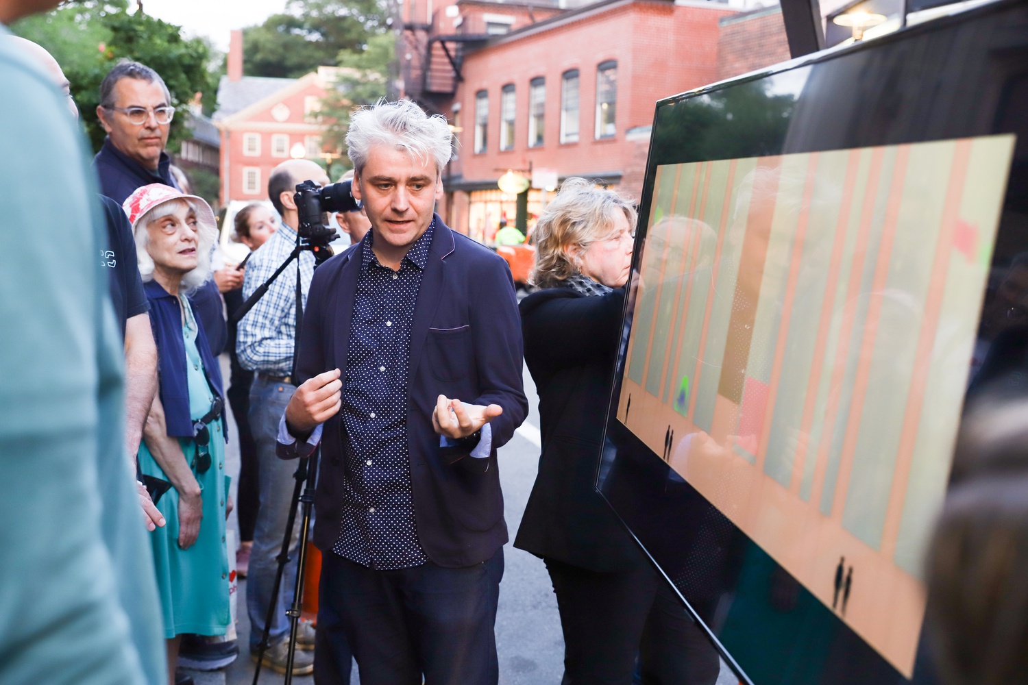 Electrical engineer Valentin Spiess demonstrates examples of possible animations on the building's facade.