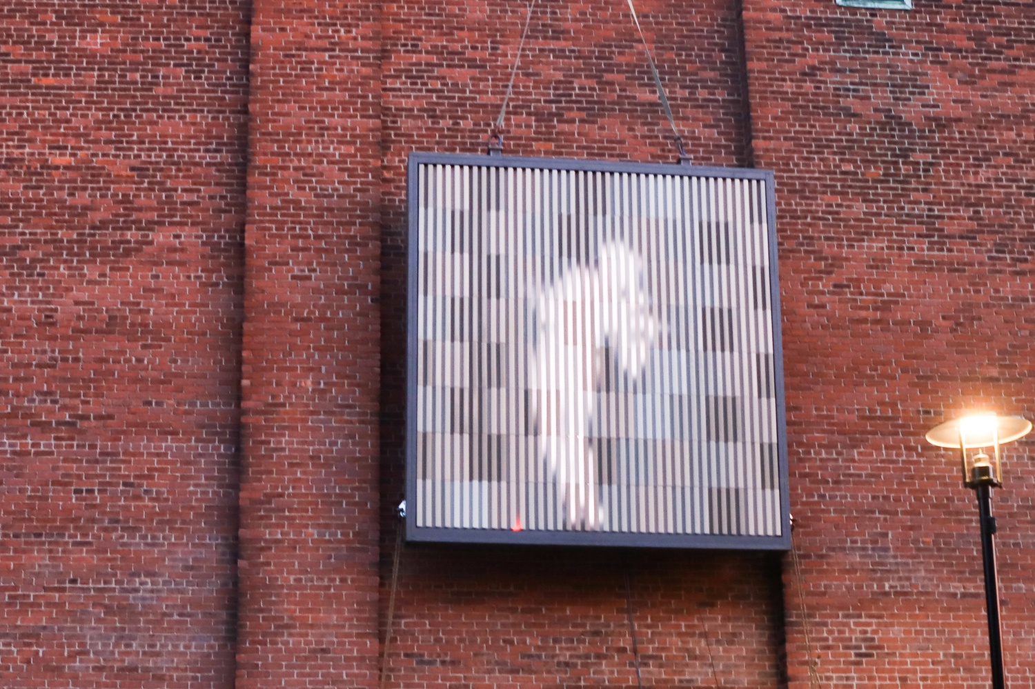 The project's team said cameras and sensors could detect kinetic movements of people in front of the building to display their silhouettes on the new building's facade.