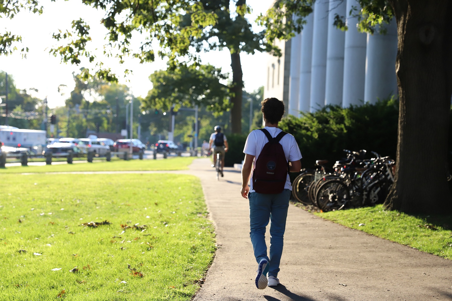 As the sun sat low in the sky, a student walked to shop a class in Littauer Hall Tuesday evening.