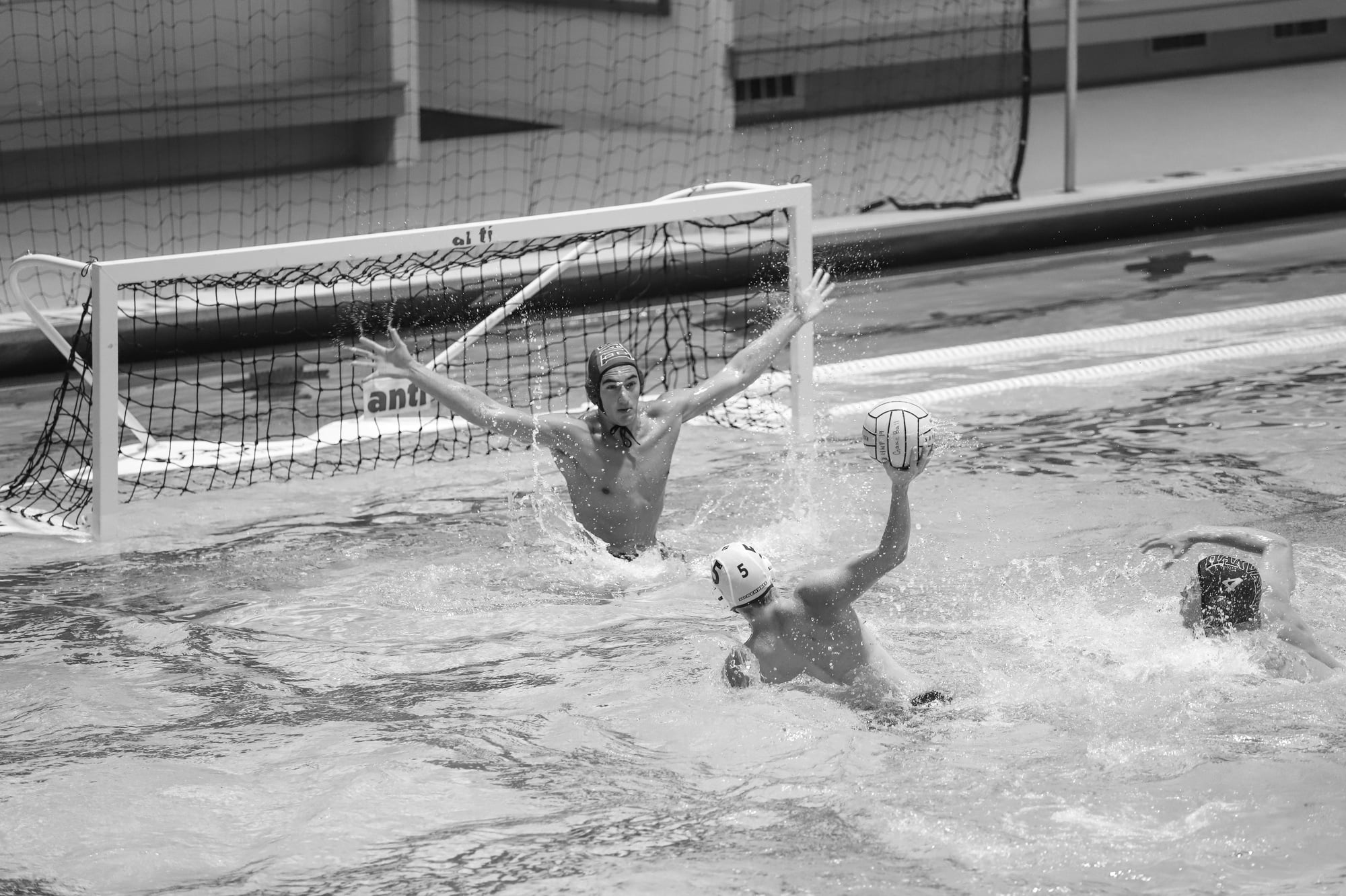 Sophomore goalie Noah Hodge defends a shot from close range. Harvard’s defense held strong in the close victory against UC San Diego, and Hodge, who was named NWPC Defensive Player of the Week last week, recorded an assist to go along with ten saves against the Tritons.