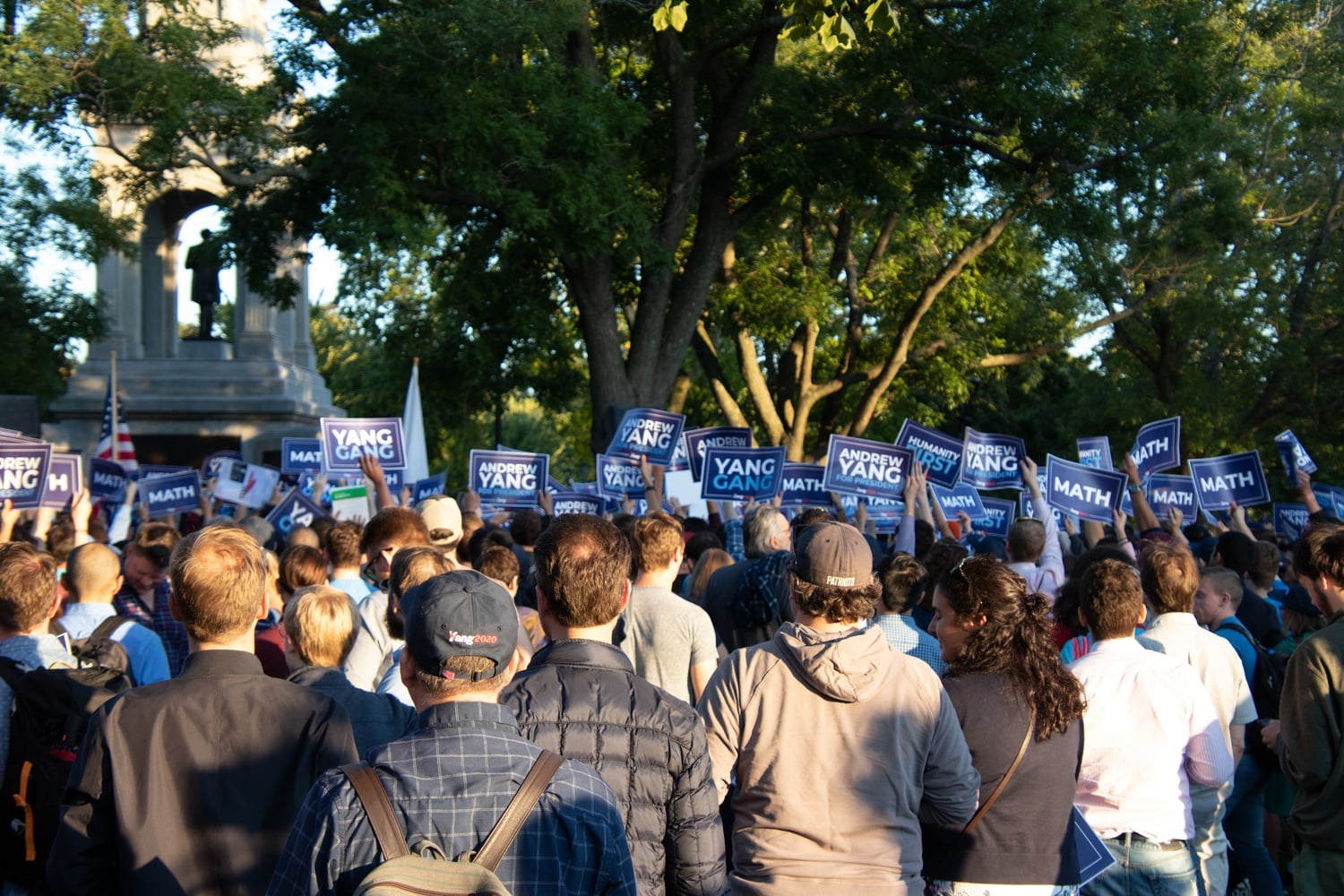 Waving "Yang Gang" signs, supporters of American Democratic presidential candidate Andrew Yang gathered in the Cambridge Commons Monday.