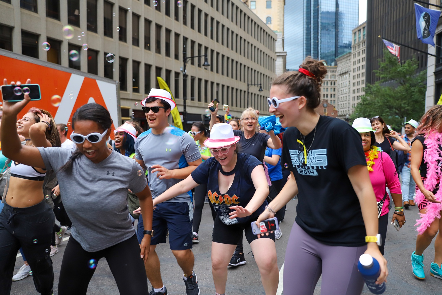 Northeastern third-year students in attendance of the Boston Dance Mile break it down in downtown Boston.