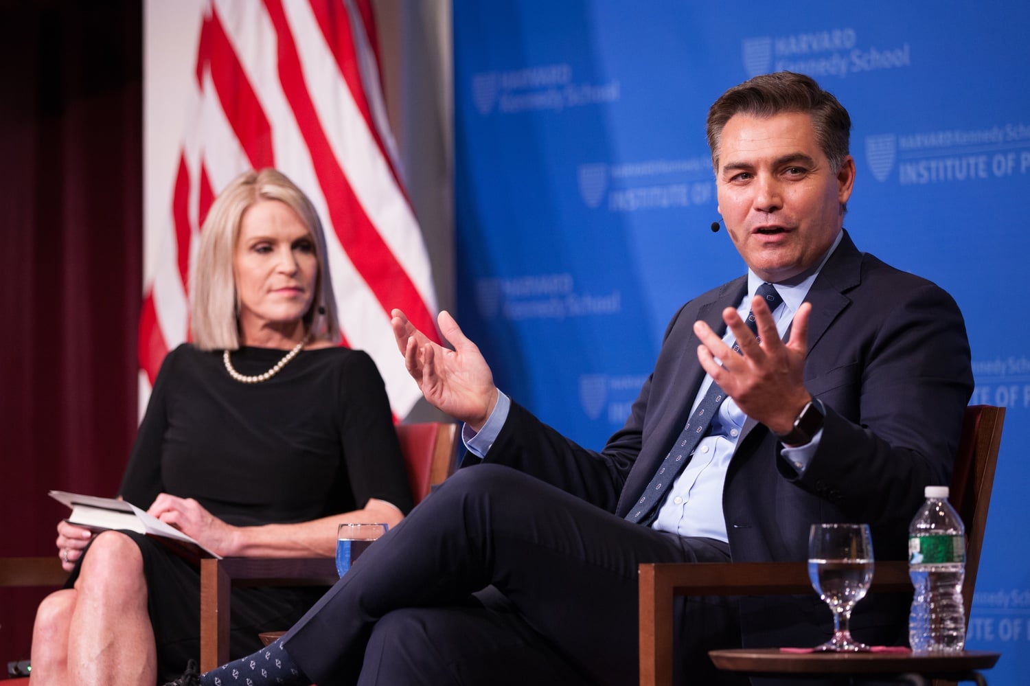 CNN commentator Alice Stewart, left, moderates a conversation with CNN White House correspondent Jim Acosta in 2019. Stewart died early Saturday morning. She was 58.