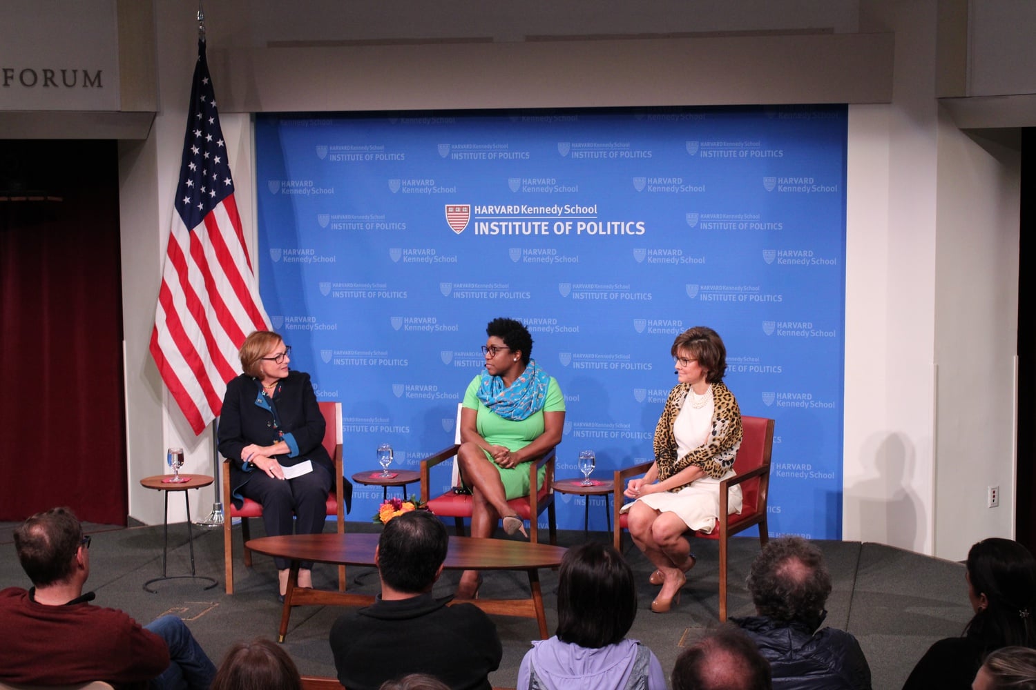 Former White House Social Social Secretary Deesha Dyer and former Chief of Protocol of the United States Capricia P. Marshall speak at the JFK Jr. Forum with moderator Jackie O'Neill, a former Harvard University Marshal.
