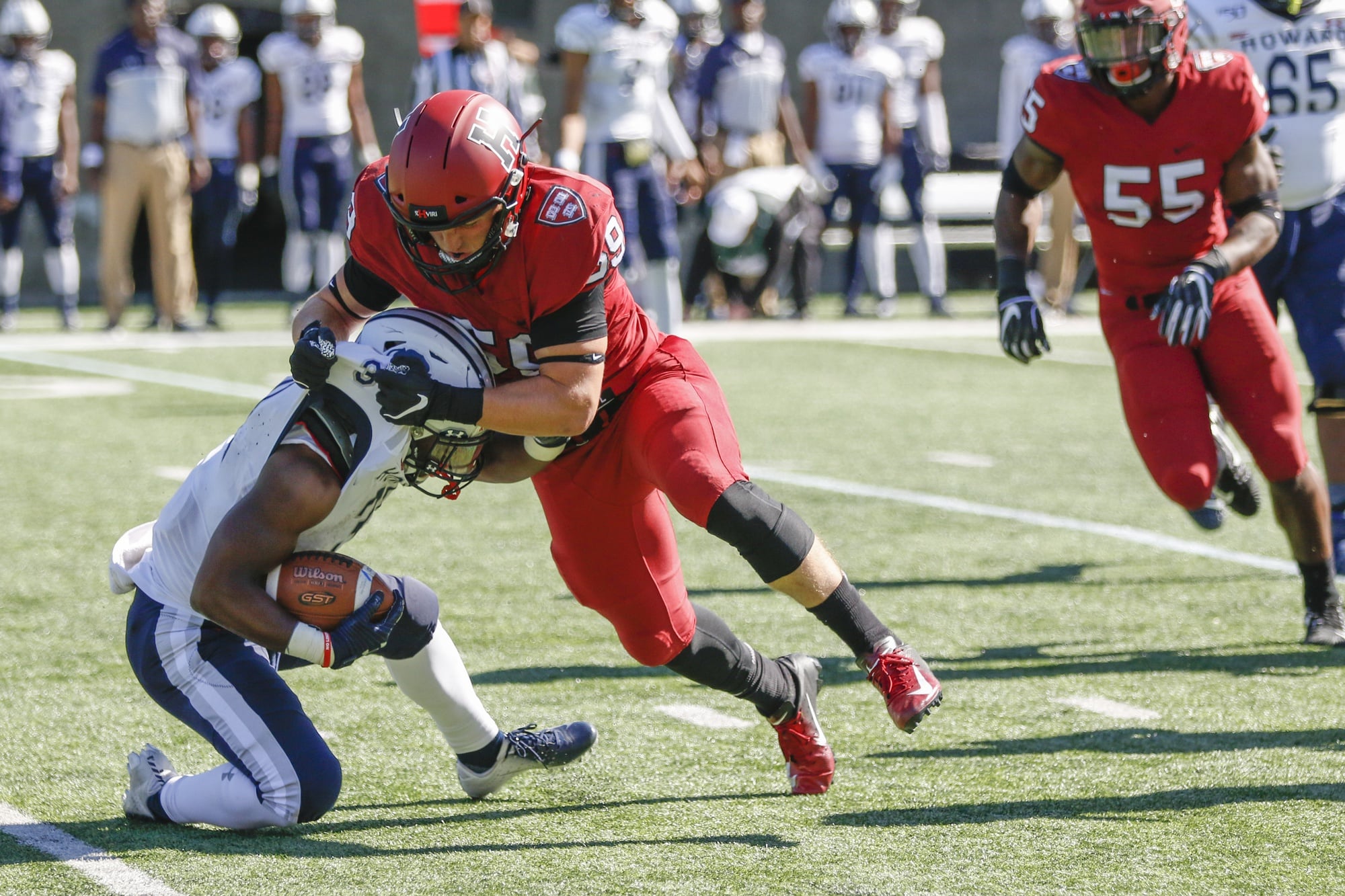 Crimson linebacker Joey Goodman takes down Bison running back Matthew Taylor. Harvard kept Howard to 48 rushing yards on the game, compared to their own 288.