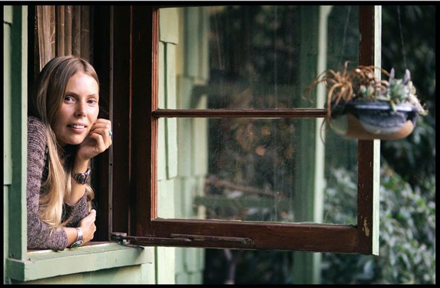Music photographer Henry Diltz took pictures of musicians including Joni Mitchell, pictured here.