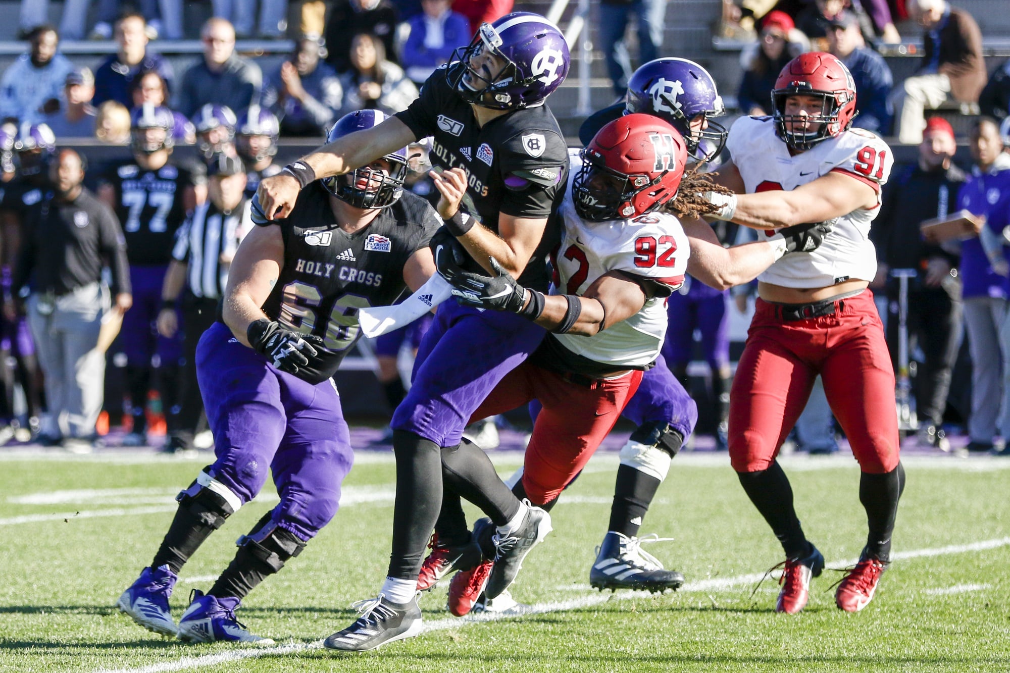 Junior defensive lineman Nassir Darnell nearly sacks Crusader quarterback Connor Degenhardt. The play caller was sacked six times on the afternoon.