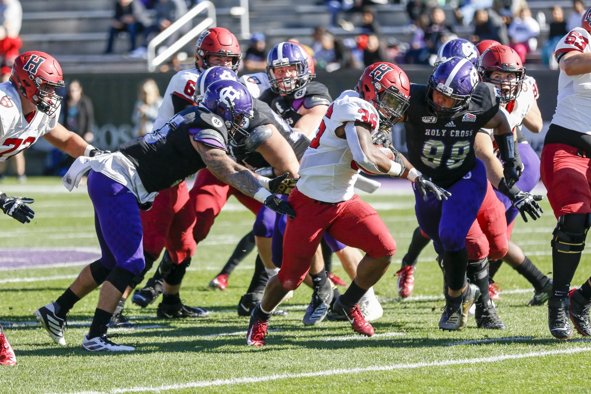 Junior rusher Devin Darrinton breaks away from the Holy Cross offense on Saturday afternoon. Darrington rushed for 109 yards and a touchdown en route to the victory.