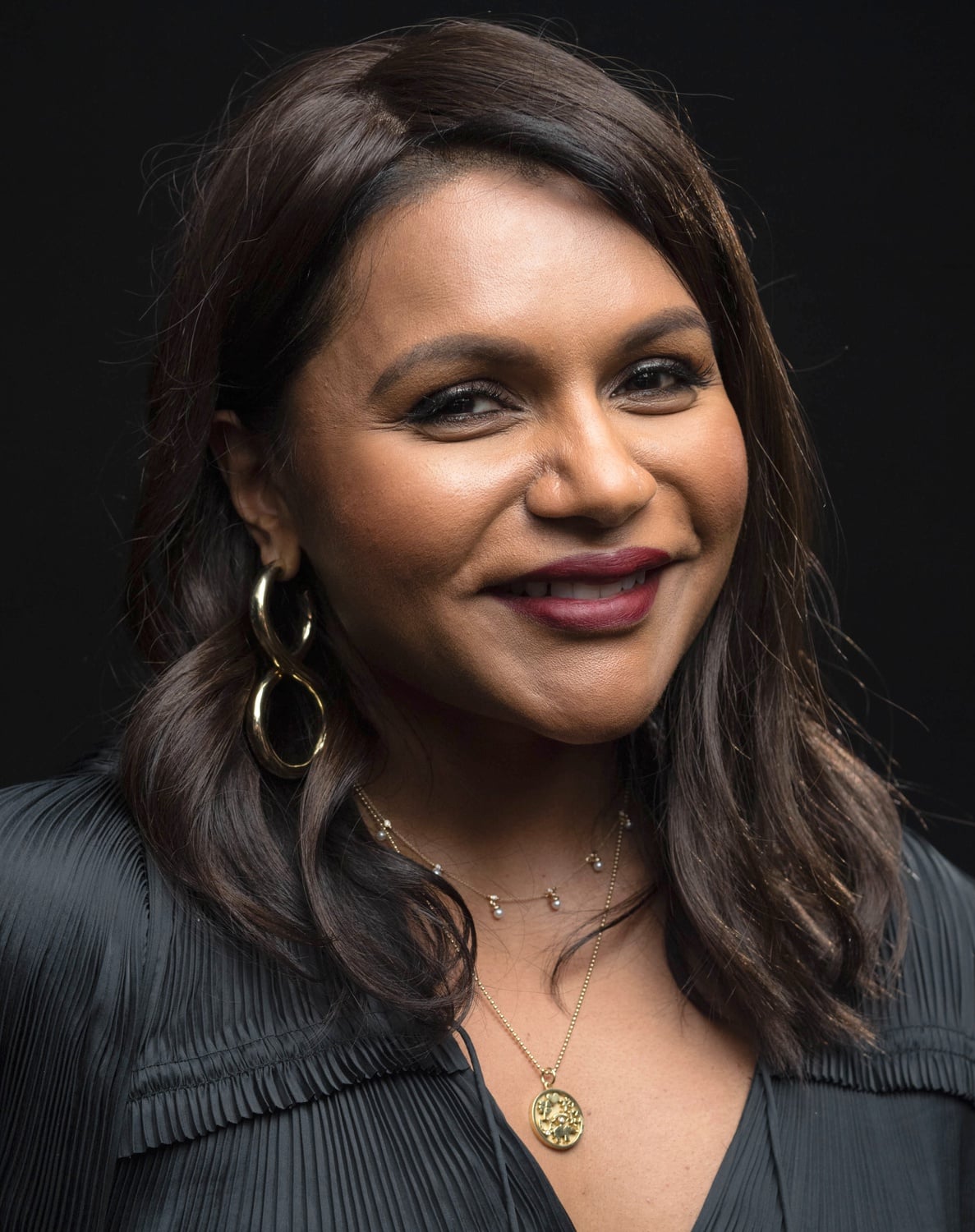 Mindy Kaling, one of the producers of "The Office," speaks out about facing racism and sexism.