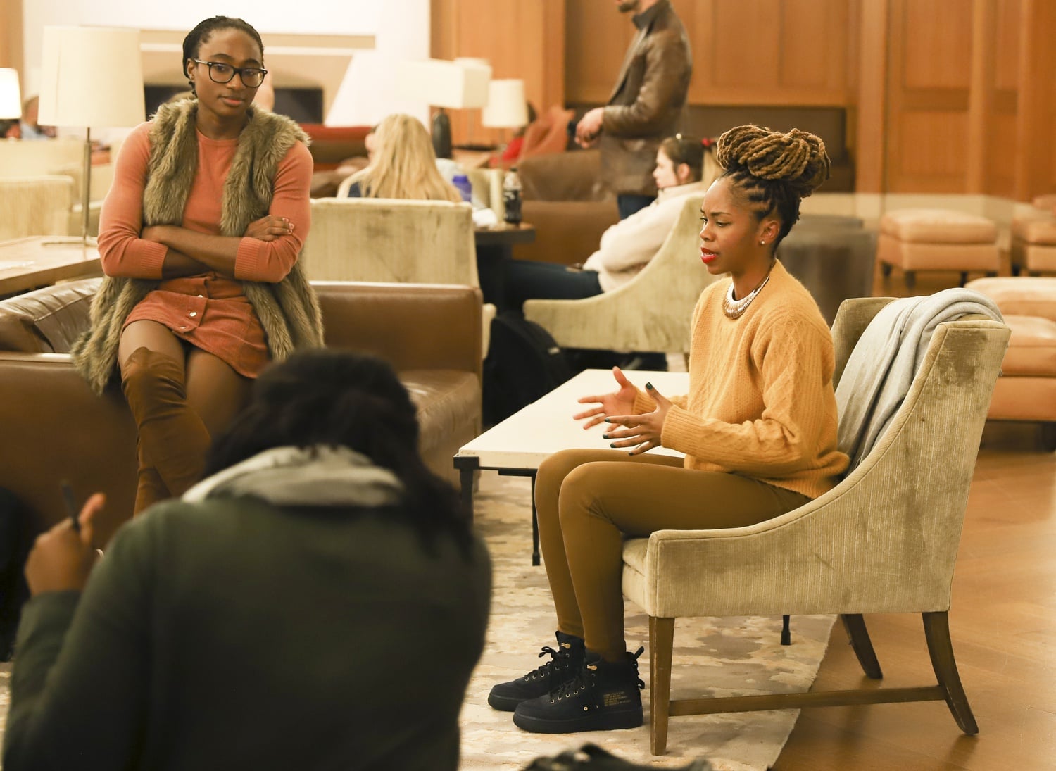 Law School alum Derecka Purnell and organizers for the Harvard Prison Divestment Campaign discuss prison abolition at an event Thursday evening.