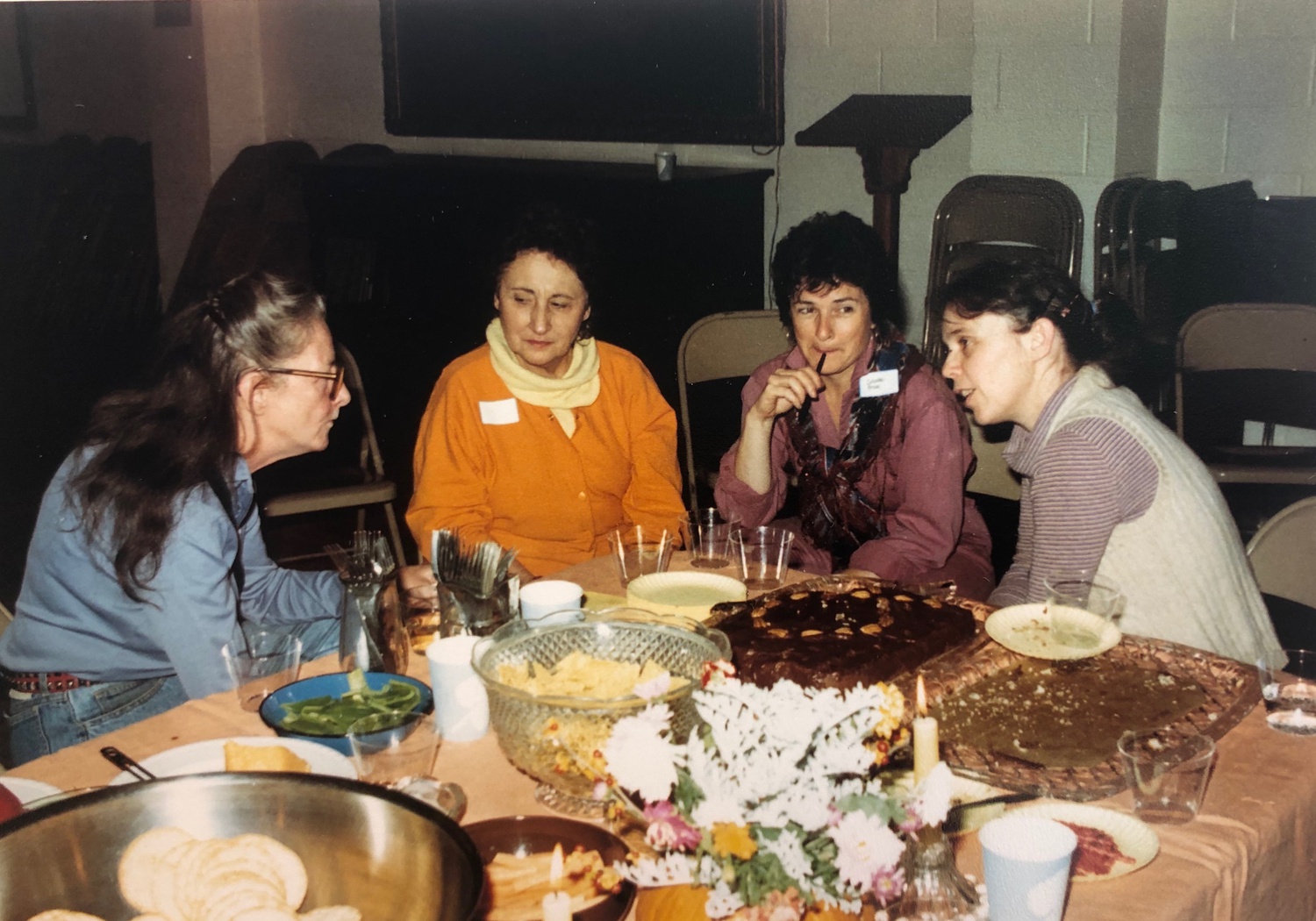 Activists Louise Thompson, Corrine Coleman, Colette Price, and Kathie Sarachild dining in October 1987 at the Park Ave. Christian Church in New York City.