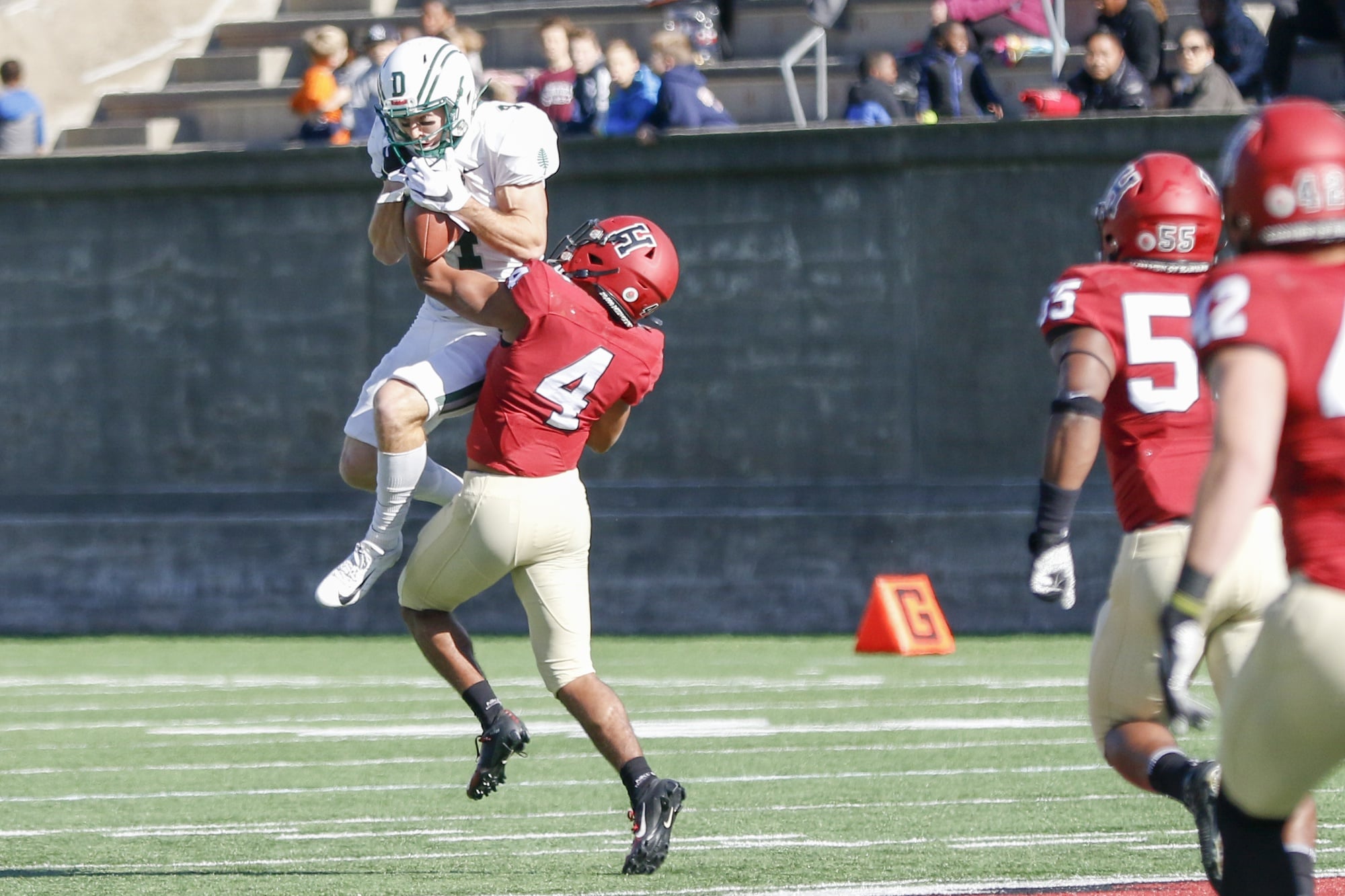 Big Green wide out Drew Estrada, makes a grab at a deep pass, only to be stripped by Harvard's Max Jones as he falls to the ground. The change of possession, listed as an interception, is Jones' first of the season.