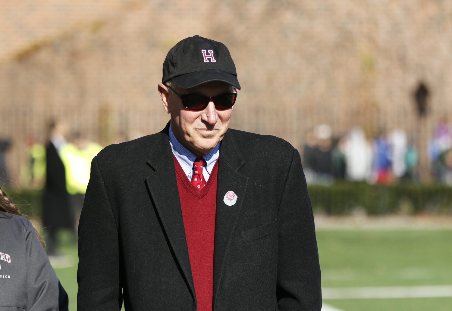 Director of Athletics Robert L. Scalise walks along the sidelines at the Harvard Dartmouth game earlier this month.