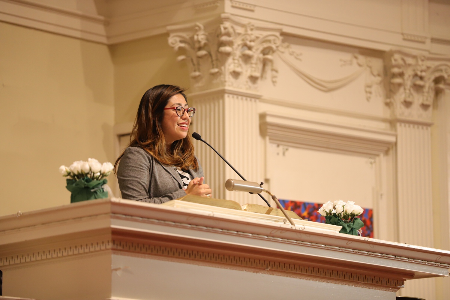 Cristina Jiménez speaks during the Robert Coles "Call of Service" Lecture  Friday evening at the First Parish Unitarian Universalist Church.