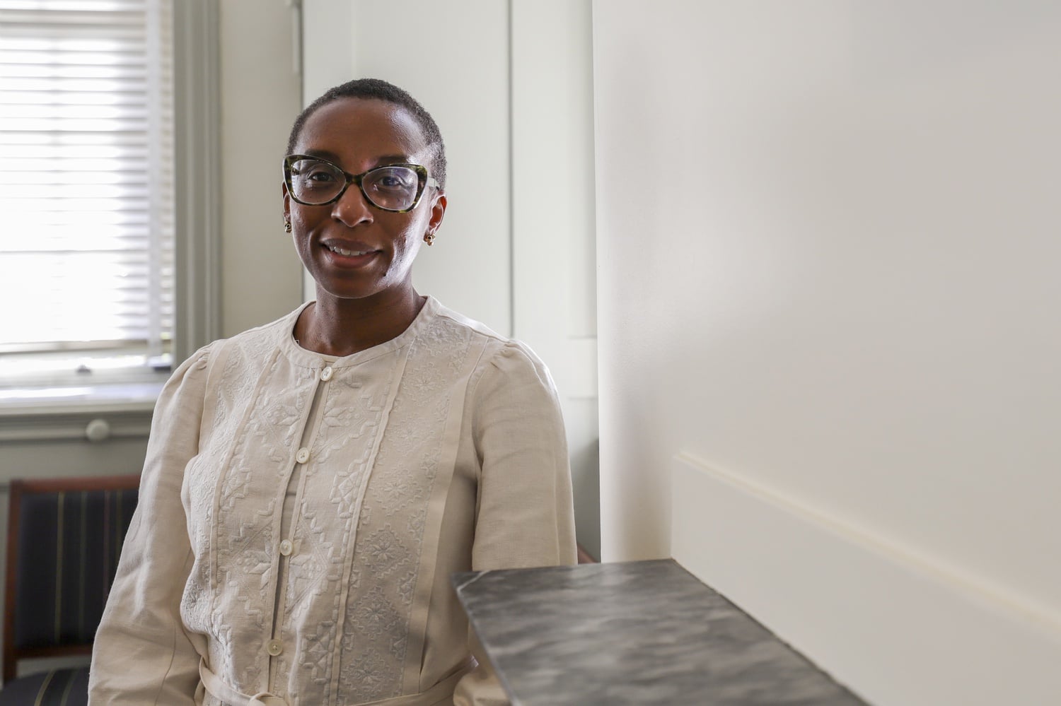 Dean of the Faculty of Arts and Sciences Claudine Gay poses for a photo in her office in University Hall.