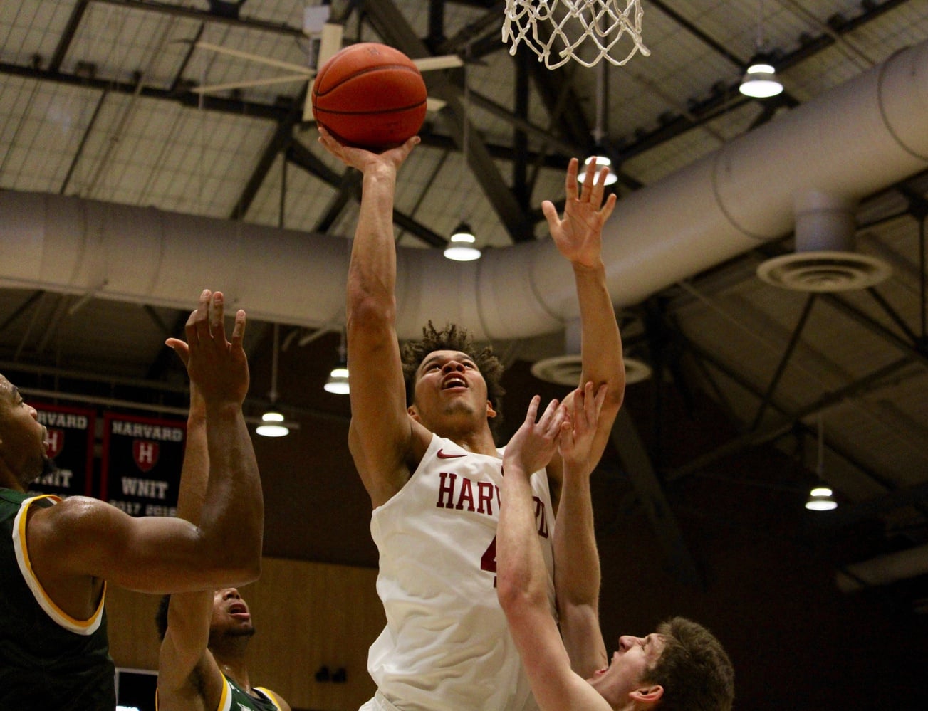 Freshman Chris Ledlum drives to the basket on what would become a career-night.