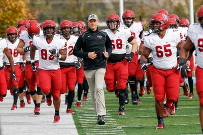 Cover image for Harvard To Face Penn in Ancient Eight Showdown