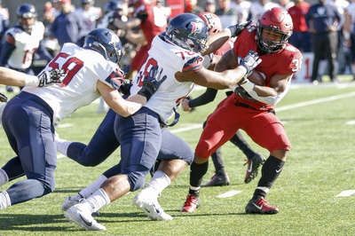Cover image for Harvard Drops Fourth-Straight Game, Losing to Penn, 24-20