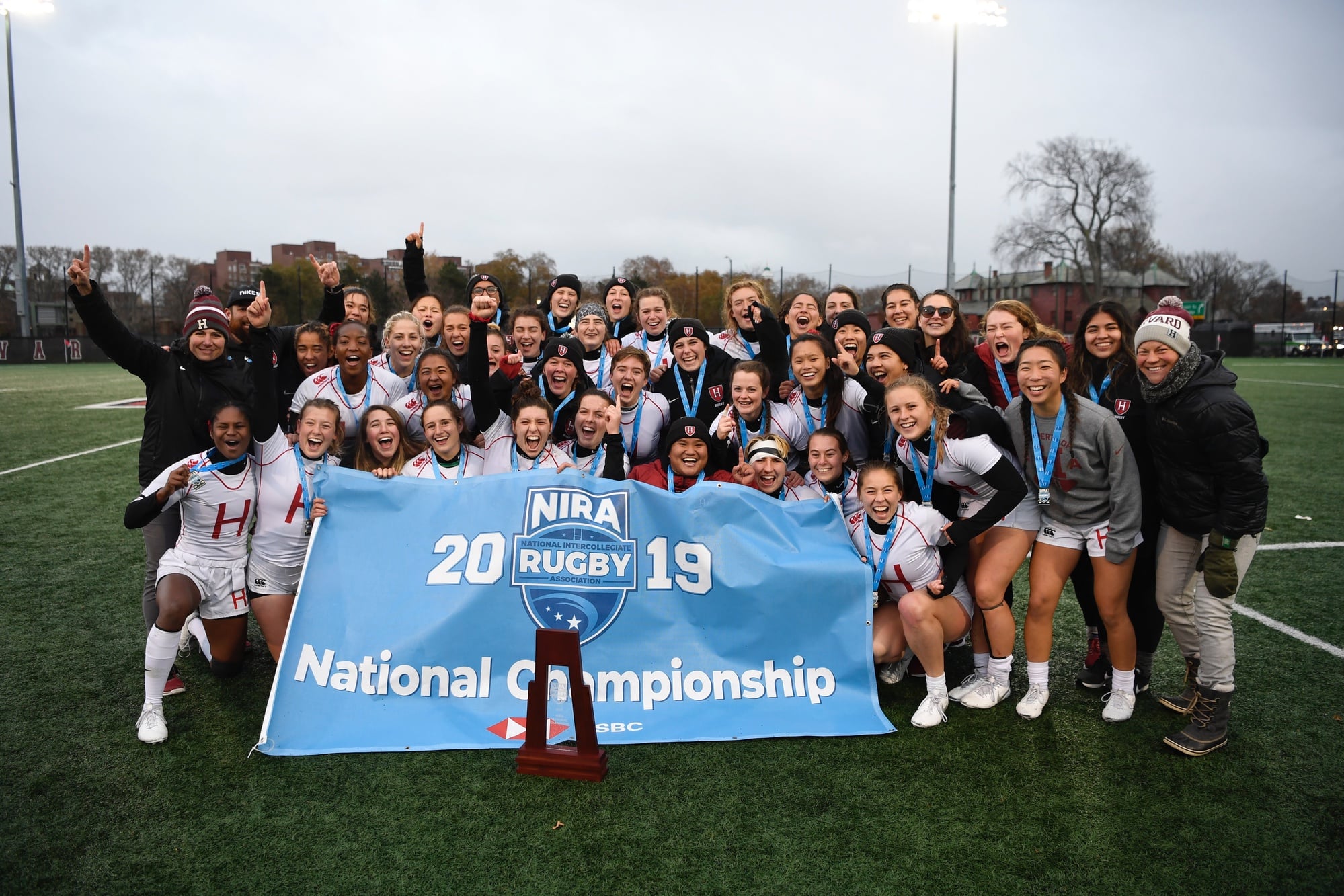 The Crimson celebrate on Mignone Field on a snowy Sunday afternoon.