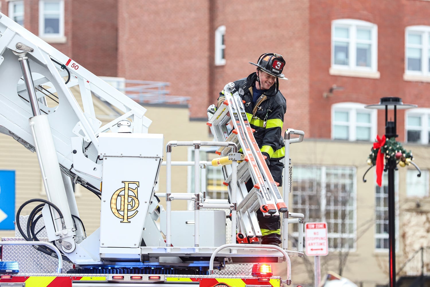 At least 40 firefighters were deployed to respond to a fire in the exhaust duct of the shared Border Cafe and Harvard Global Health Institute building at 32 Church St. Sunday afternoon.