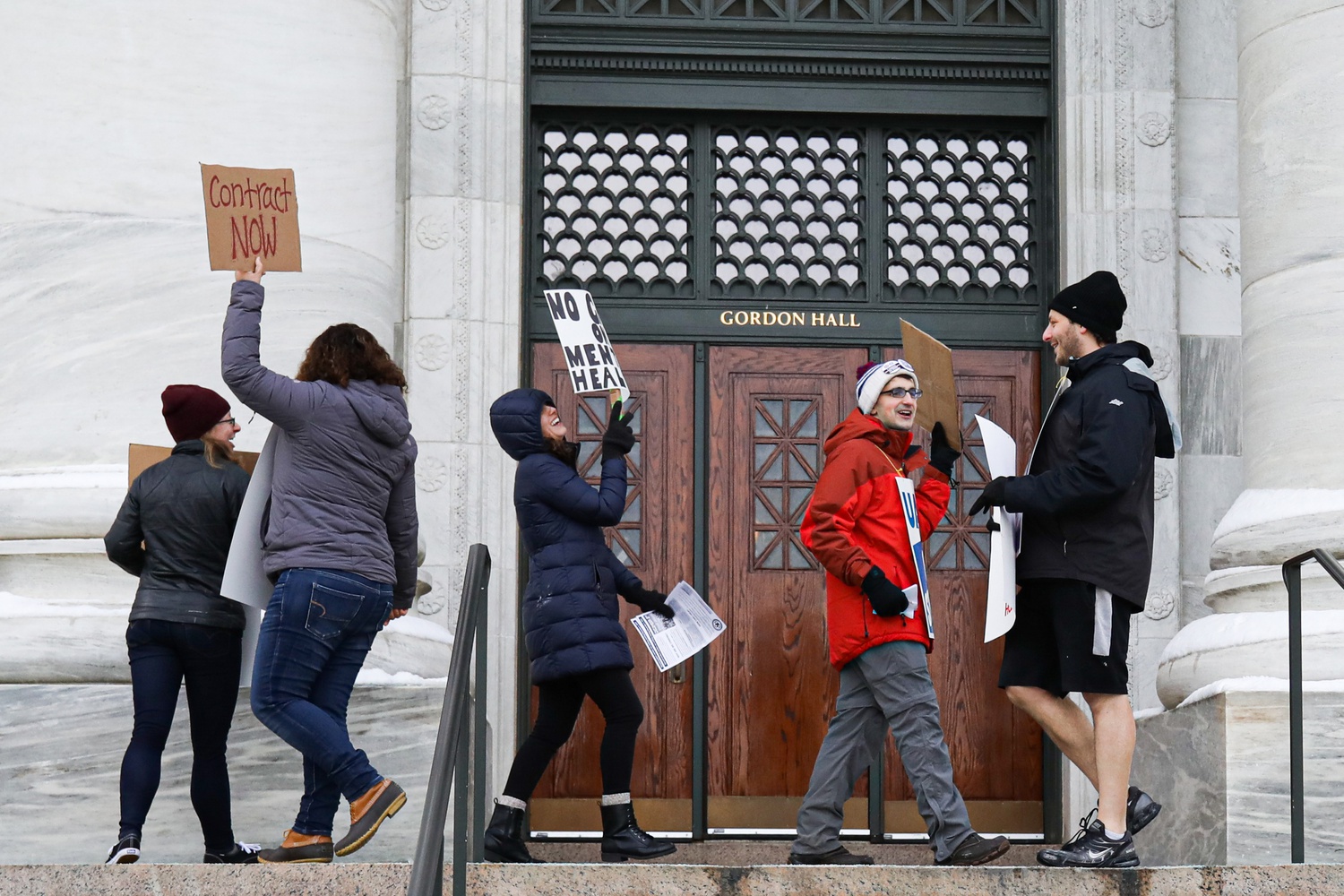 Picketers gathered outside of Gordon Hall on Harvard's Longwood campus as part of the graduate student union's strike.