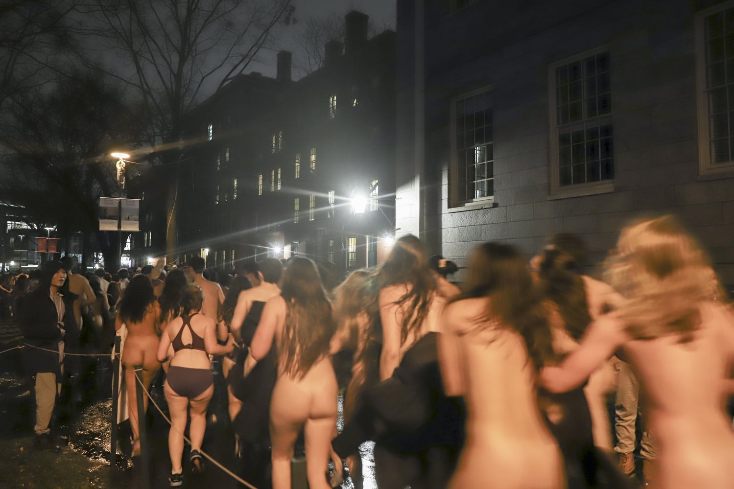 On rainy Monday night, a large number of students gathered in the Harvard Yard for Primal Scream, a biannual tradition where students run naked around the Yard before finals begin.