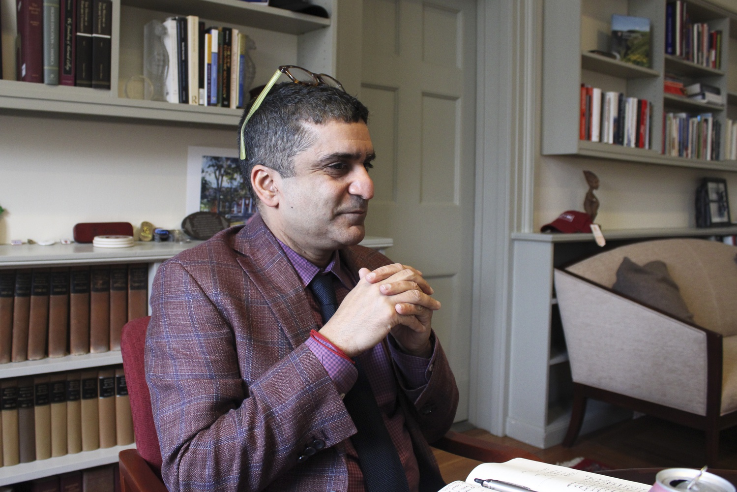 Dean of the College Rakesh Khurana sits in his office in University Hall during an interview on Tuesday.