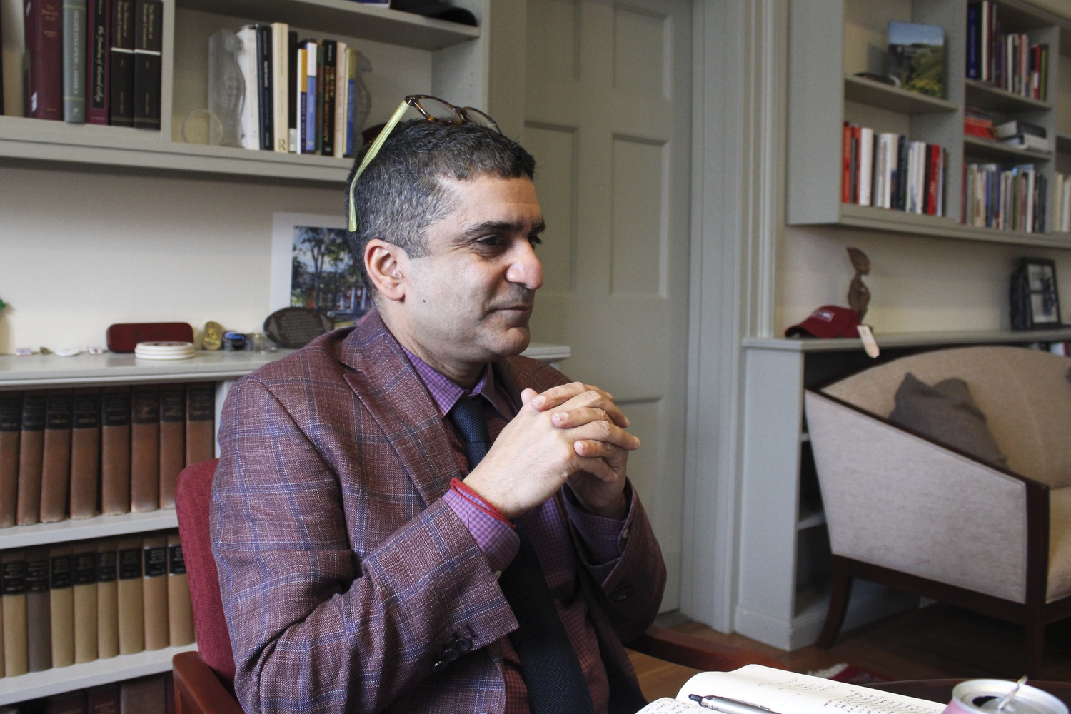 Dean of the College Rakesh Khurana sits in his office in University Hall during an interview on Tuesday.