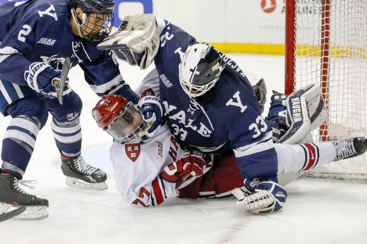 Yale net-minder Corbin Kaczperski let his frustration get the best of him when he piled on — and threw punches at — Harvard freshman Henry Thrun late in the contest.