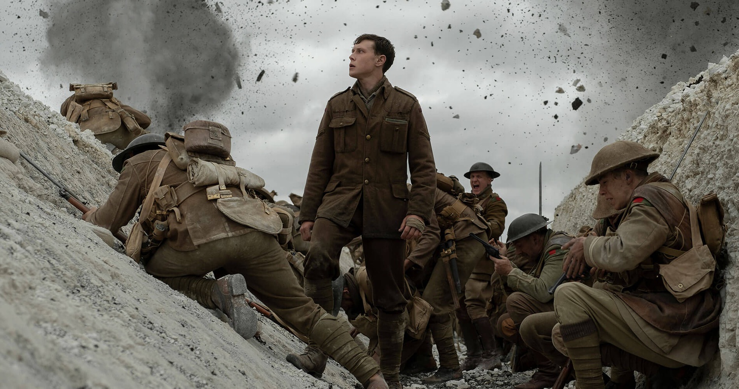 George MacKay (center) stars as Lance Corporal Will Schofield in "1917" (2019), directed by Sam Mendes.