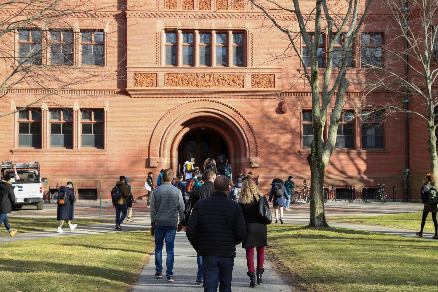 Students enter Sever Hall.