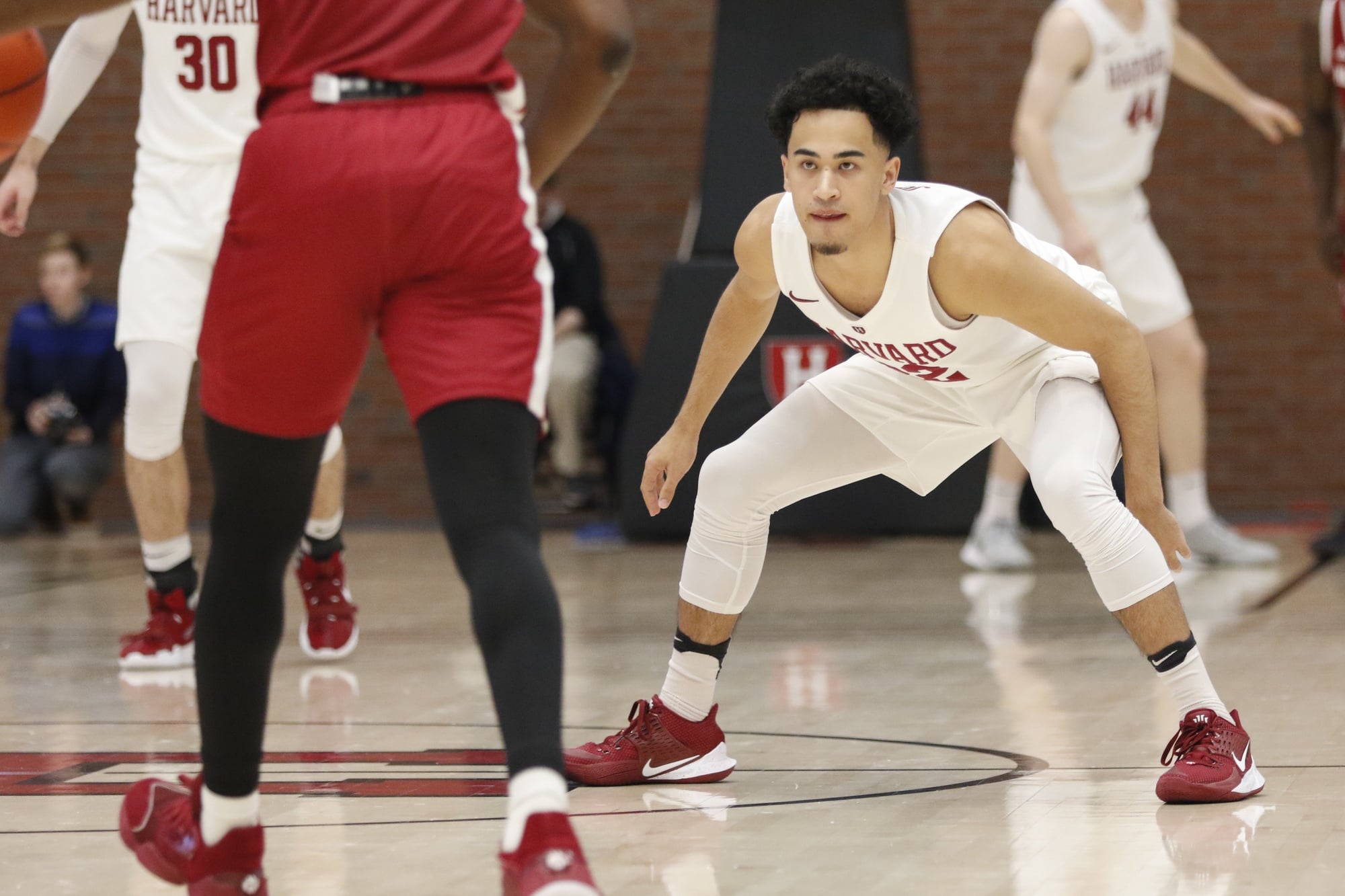 With the Harvard team facing key injuries, senior guard Christian Juzang has had to take the reins both on and off the court.