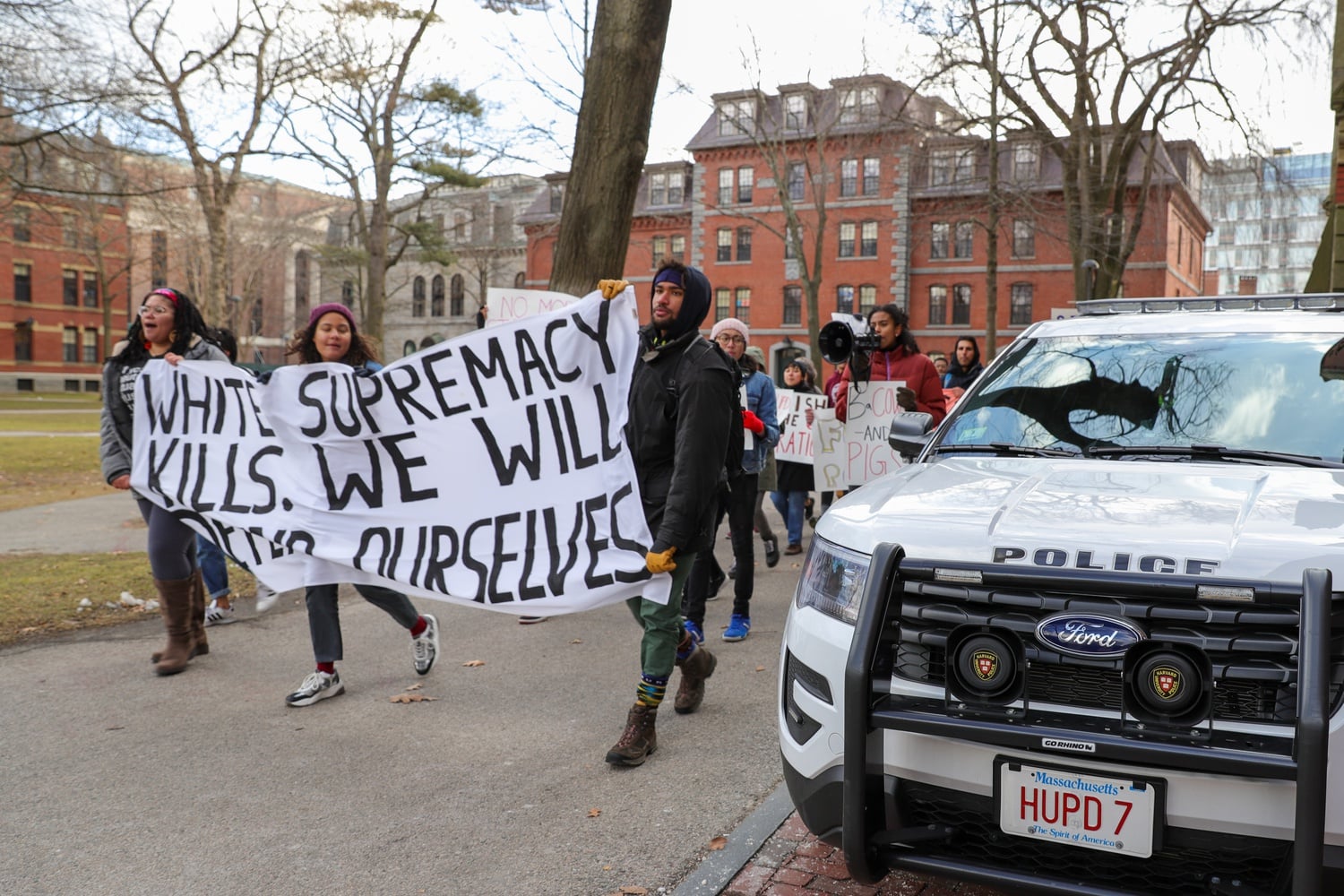 Protesters called for then-HUPD Chief Francis D. "Bud" Riley's removal in February 2020.