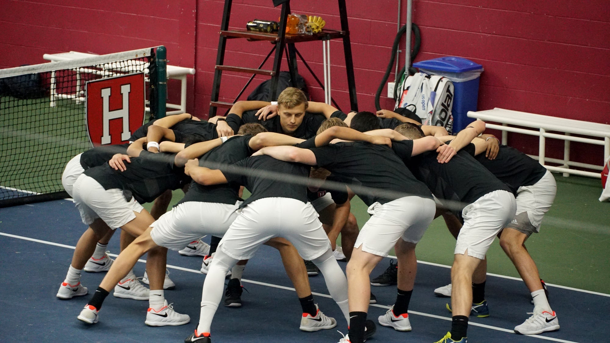 The Crimson men get together for a pre-match huddle before the highly anticipated ECAC Tournament.