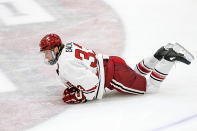 Cover image for No. 20 Men's Hockey Ousted by St. Lawrence, 6-3