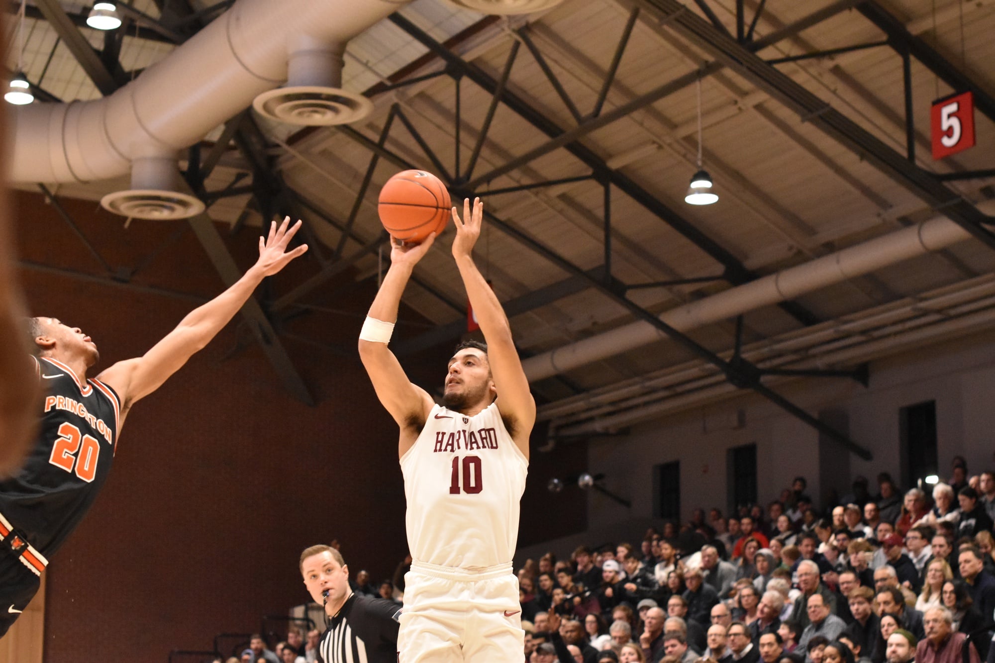 Noah Kirkwood rises for a shot against Princeton. The sophomore guard has become Harvard's go-to scorer in the absence of Bryce Aiken, averaging over 15 points per game in the last nine.