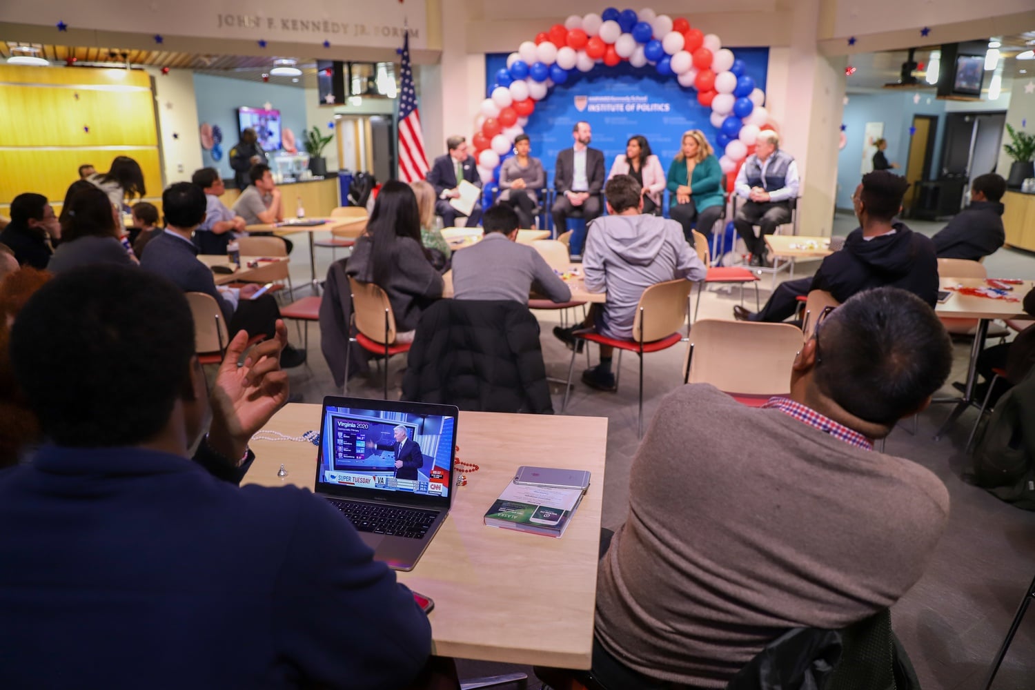 Students await election results during the Institute of Politics' most recent in-person forum event, on Super Tuesday in March 2020. A new IOP poll found that young Americans are much more hopeful about the country's future than they were four years ago.