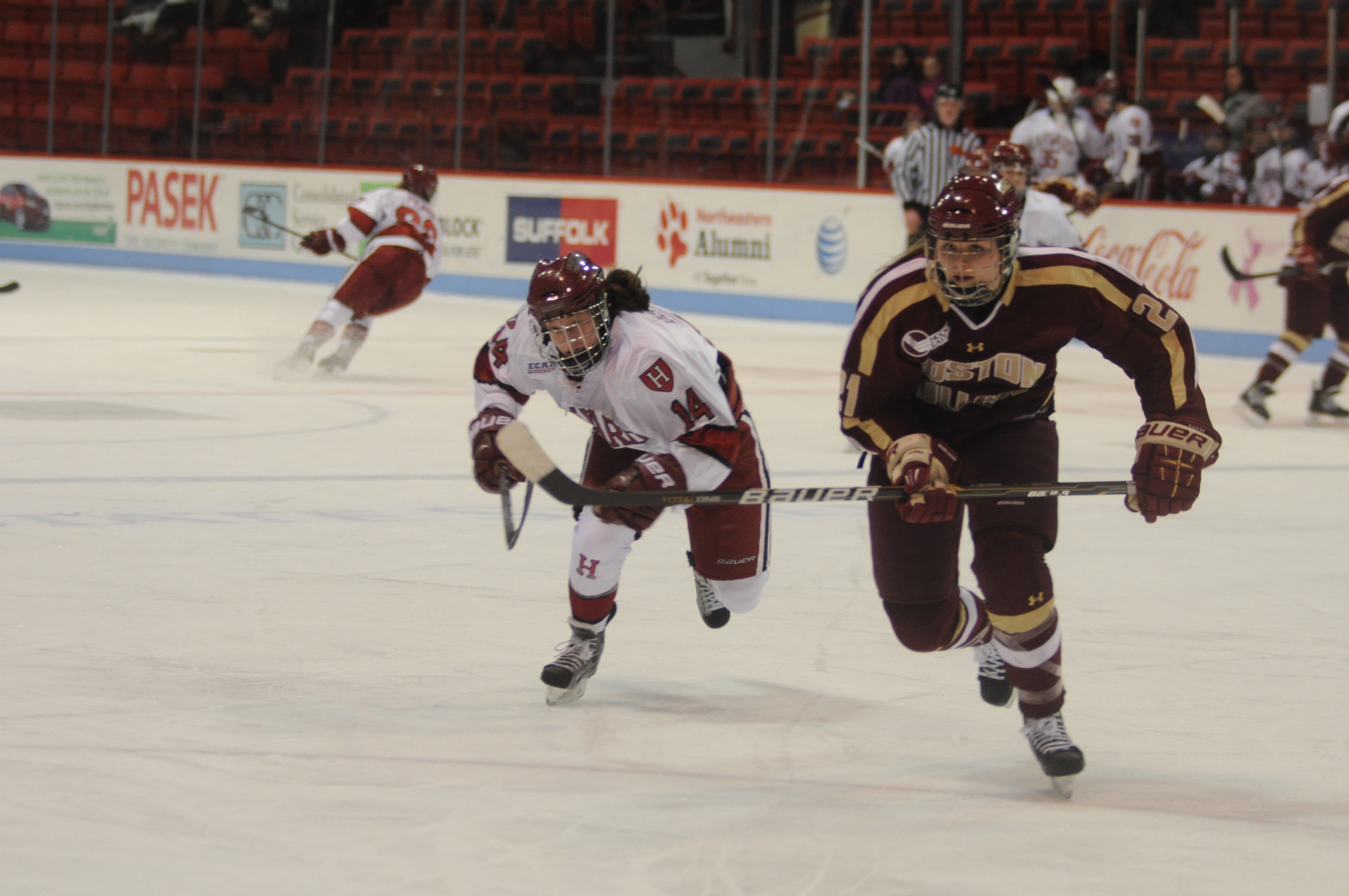 Jillian Dempsey ‘13 hustles back into the play against Boston College in 2013.