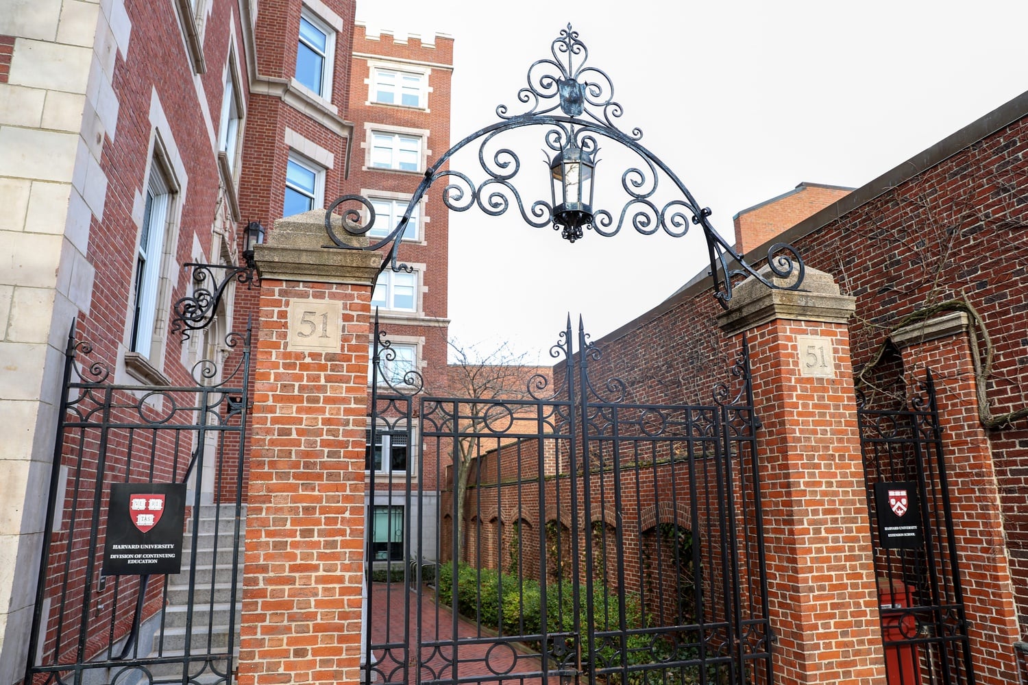 The Harvard Extension School Office sits on Brattle Street in Cambridge. Students and faculty are already familiar with the now-widespread Zoom online conferencing interface.