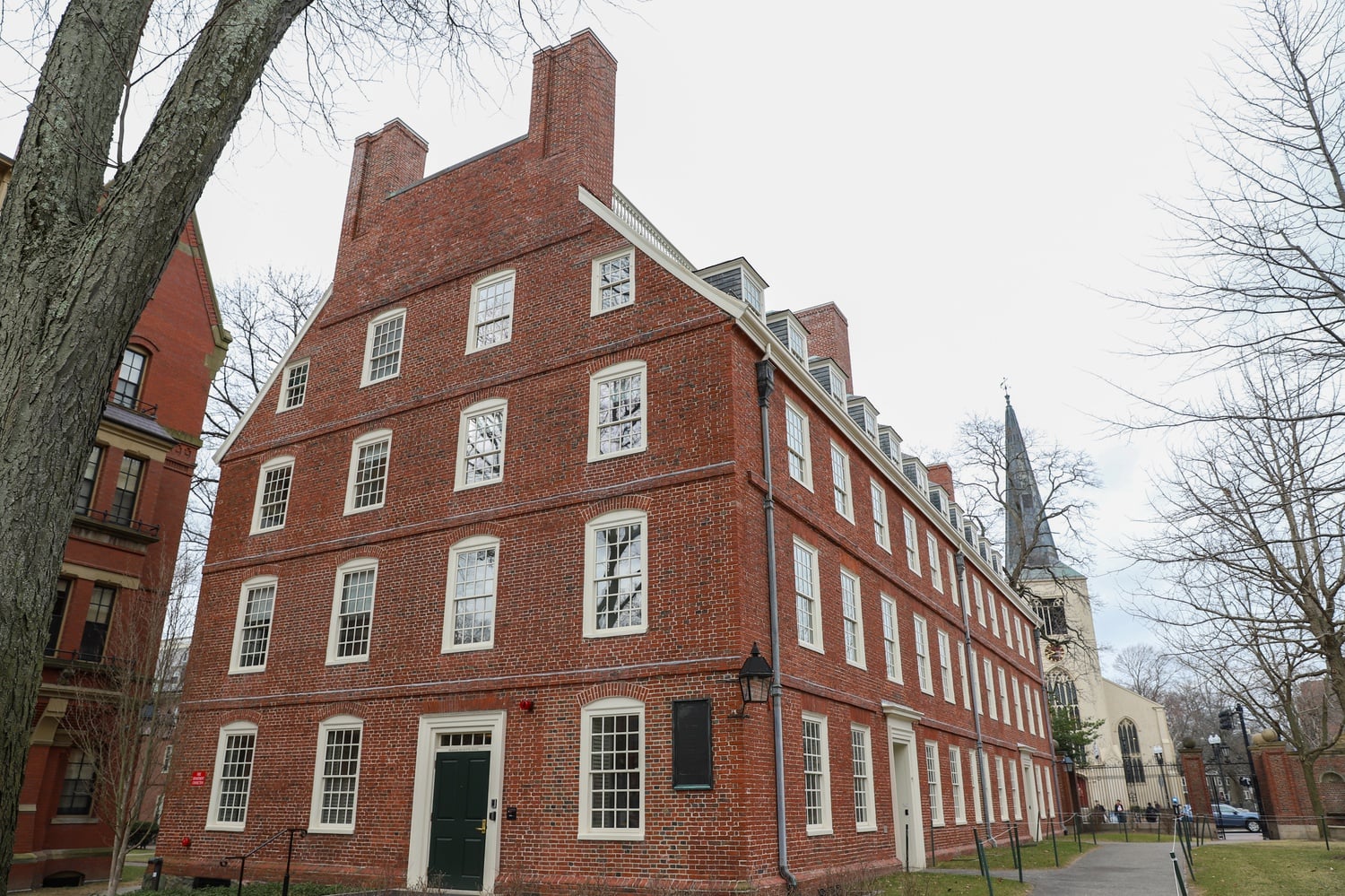 University President Lawrence S. Bacow launched a committee Monday to form "general principles" for renaming spaces, programs, and professorships at Harvard that are linked to "abhorrent" activities.