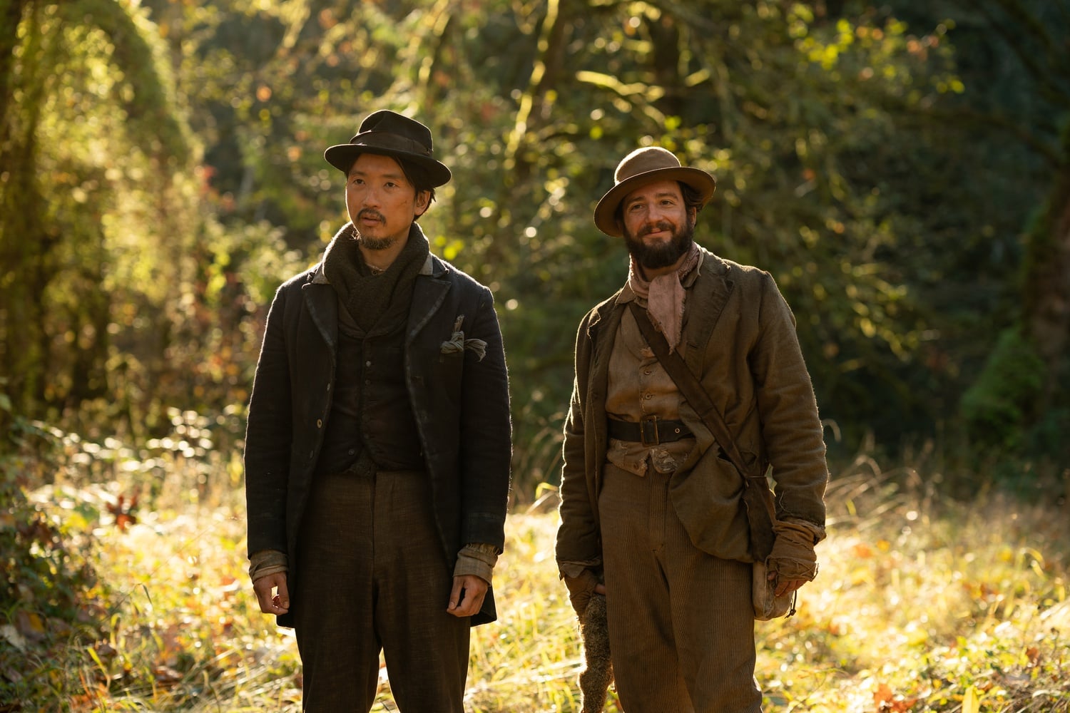 Orion Lee (left) stars as King Lu and John Magaro (right) stars as Cookie in "First Cow" (2020), directed by Kelly Reichardt.