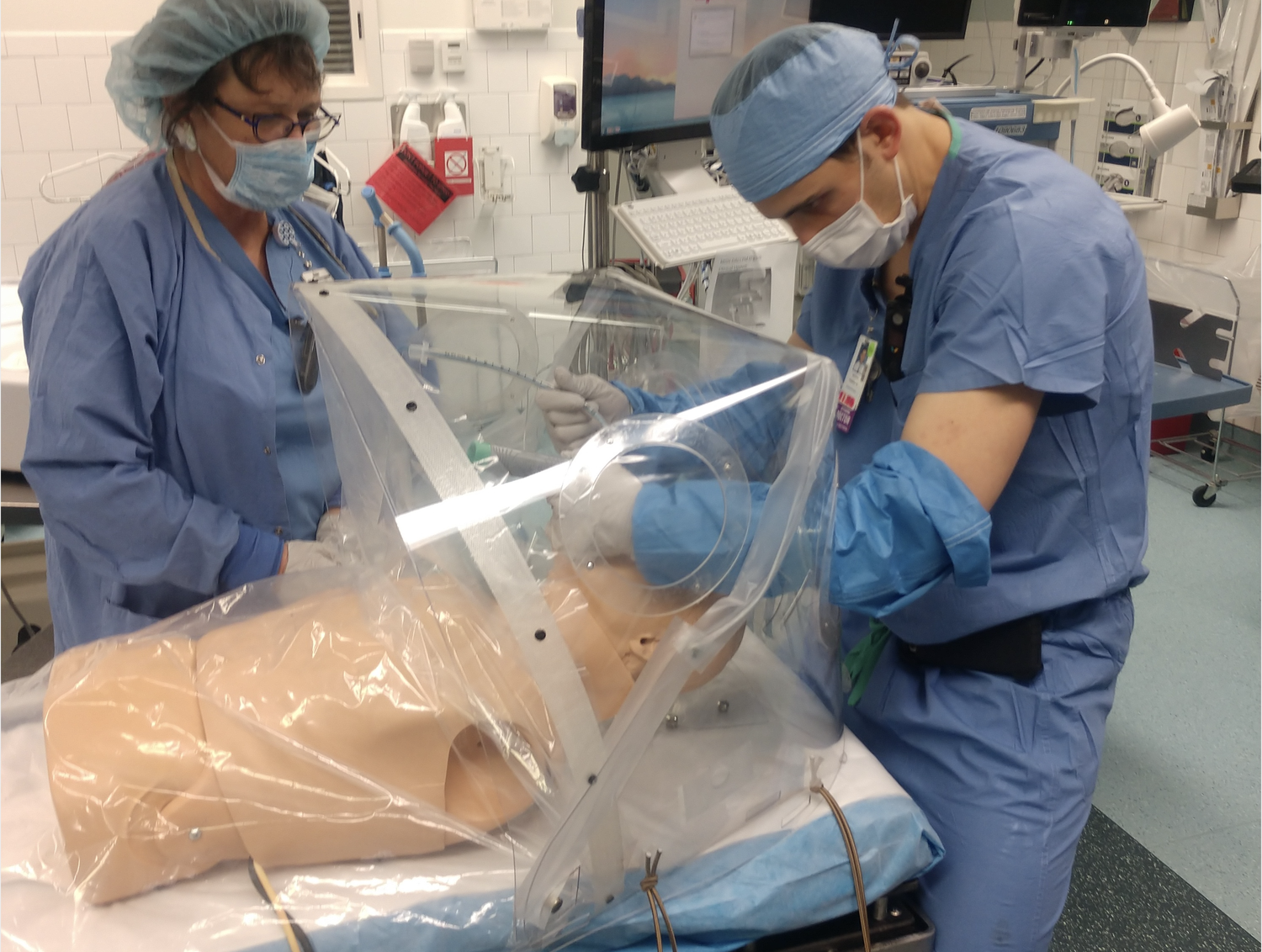 Doctors at Massachusetts General Hospital tested a prototype of a Patient Isolation Hood designed and constructed by Graduate School of Design faculty and staff, in coordination with the MGB Center for COVID Innovation.