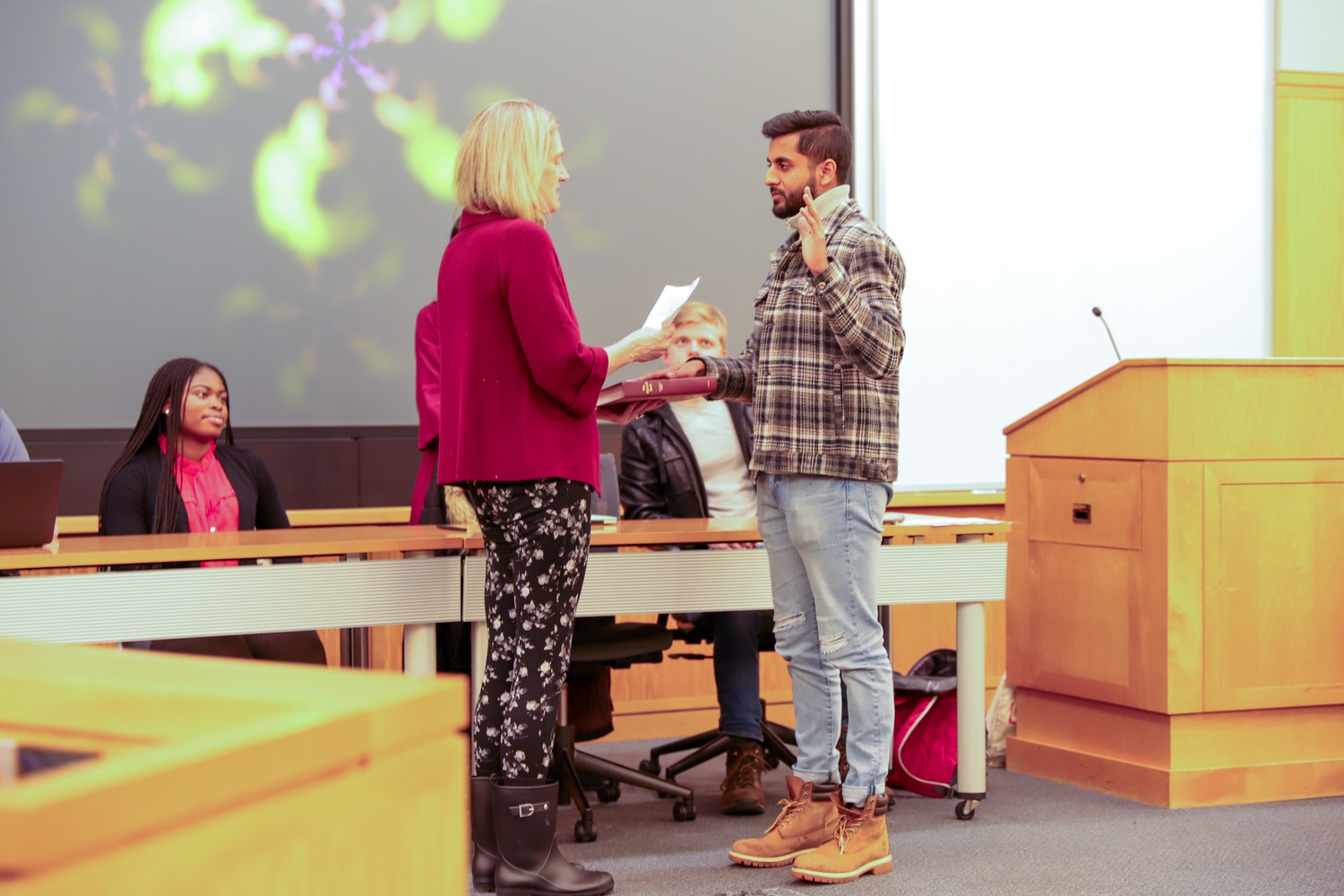 At a ceremony in December 2019, the incoming Undergraduate Council president, James A. Mathew '21, was formally inducted at the inauguration ceremony by Dean of Students Katherine G. O'Dair.