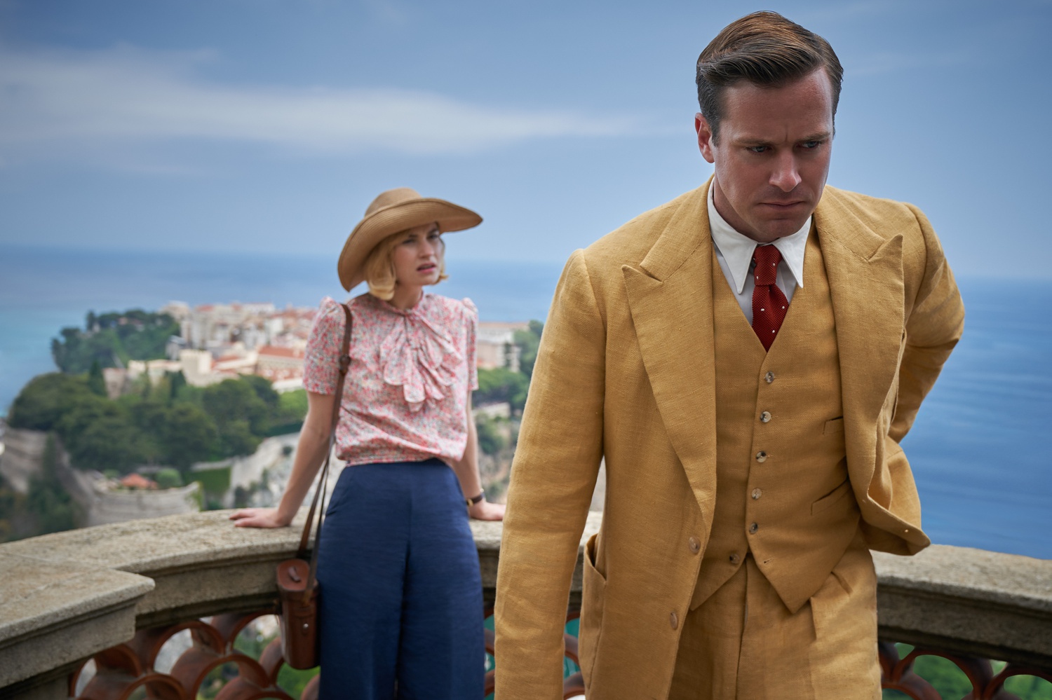 Lily James stars as Mrs. de Winter and Armie Hammer stars as Maxim de Winter in "Rebecca" (2020), directed by Ben Wheatley.